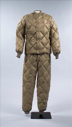 The B-9 down flight suit designed by Eddie Bauer for the U.S. Army Air Forces, WWII — quilted olive drab jacket and pants